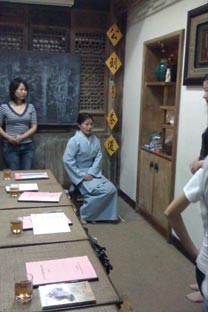 Learning how to sit gracefully with teacher Hu