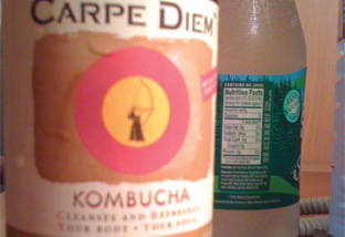 Carpe Diem Kombucha in a bottle is light.