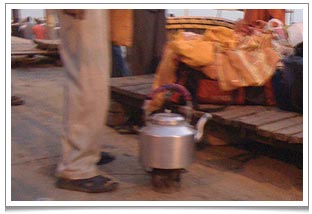 The Ganges lemon tea seller's ingenious portable kettle with stove attached. The Ganges lemon tea seller's ingenious portable kettle with stove attached.