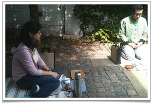 MedTEAtation ritual at Chaya Teahouse in the forecourt with our tea friend, Sam.