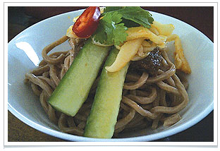 Oolong tea noodles with homemade hunan-style sauce at chaya teahouse.